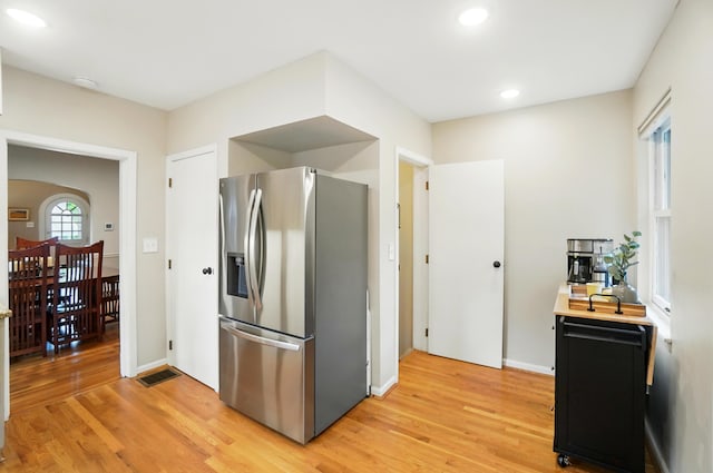 134 Strathmore Ave, Fort Thomas, KY 41075 - kitchen featuring stainless steel fridge with ice dispenser, light wood-style flooring, light countertops, and recessed lighting