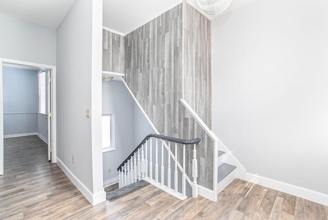 718 Central Ave, Newport, KY 41071 - stairs with wood finished floors and baseboards