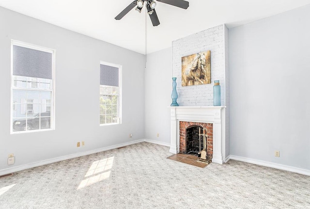 718 Central Ave, Newport, KY 41071 - unfurnished living room with carpet floors, a ceiling fan, a fireplace, and baseboards