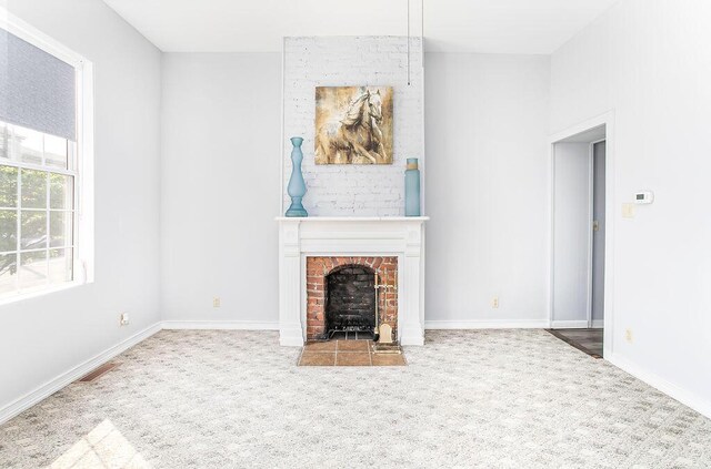 718 Central Ave, Newport, KY 41071 - unfurnished living room with carpet, a fireplace, and baseboards