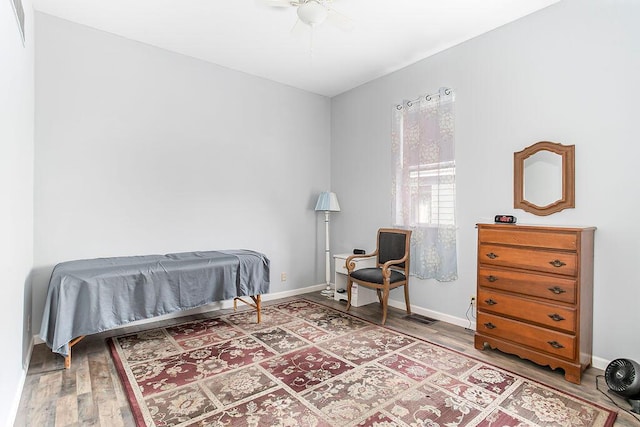 718 Central Ave, Newport, KY 41071 - bedroom with wood finished floors, ceiling fan, and baseboards