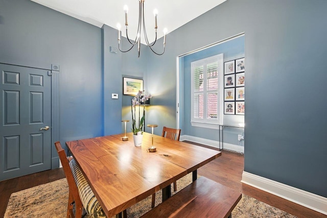 842 Monroe St, Newport, KY 41071 - dining space featuring a chandelier, wood finished floors, and a high ceiling