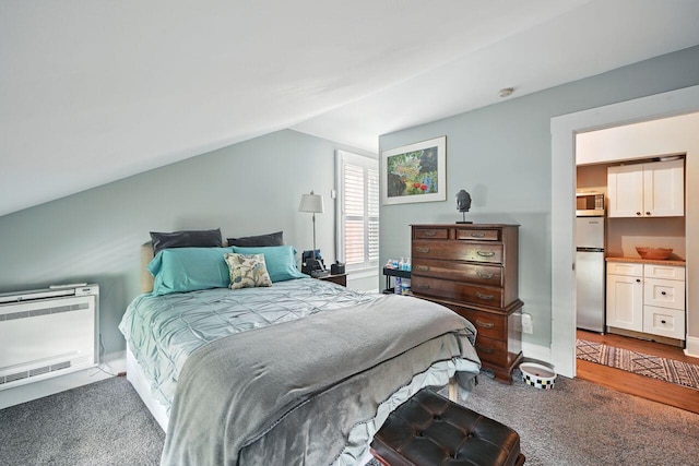 842 Monroe St, Newport, KY 41071 - carpeted bedroom with vaulted ceiling and stainless steel fridge