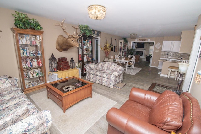 1727 Shaw Rd, Independence, KY 41051 - living area with wood finished floors and a fireplace