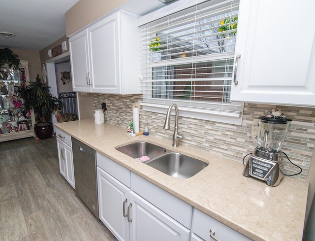 1727 Shaw Rd, Independence, KY 41051 - kitchen featuring a sink, stainless steel dishwasher, white cabinetry, and backsplash