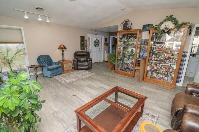 1727 Shaw Rd, Independence, KY 41051 - living area featuring wood finished floors and vaulted ceiling