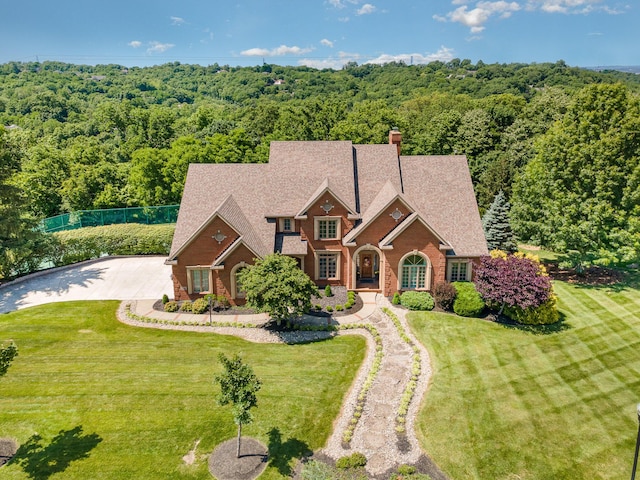 2090 Edenderry Dr, Fort Mitchell, KY 41017 - view of front facade with a chimney and a forest view