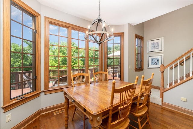 2090 Edenderry Dr, Fort Mitchell, KY 41017 - dining area with a chandelier, baseboards, and wood finished floors