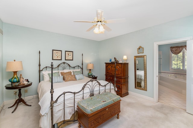 2090 Edenderry Dr, Fort Mitchell, KY 41017 - bedroom featuring light carpet, baseboards, ensuite bathroom, and ceiling fan