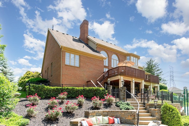2090 Edenderry Dr, Fort Mitchell, KY 41017 - back of house featuring stairway, a chimney, and brick siding