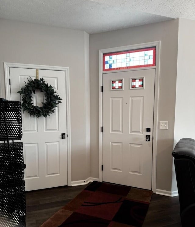 9072 Timberbrook Ln Unit B, Florence, KY 41042 - foyer entrance featuring dark wood-type flooring and baseboards