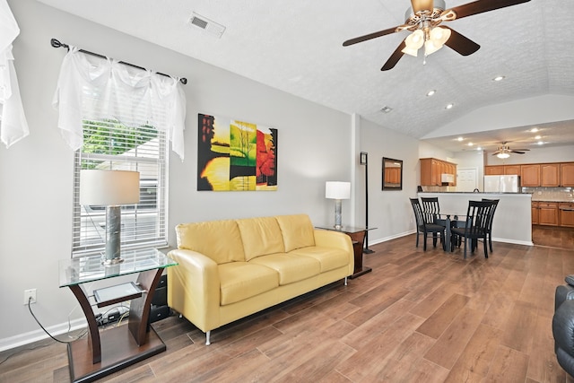 9072 Timberbrook Ln Unit B, Florence, KY 41042 - living room with ceiling fan, recessed lighting, vaulted ceiling, wood finished floors, and baseboards