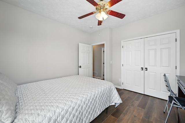 9072 Timberbrook Ln Unit B, Florence, KY 41042 - bedroom featuring dark wood-style floors, a closet, and a ceiling fan