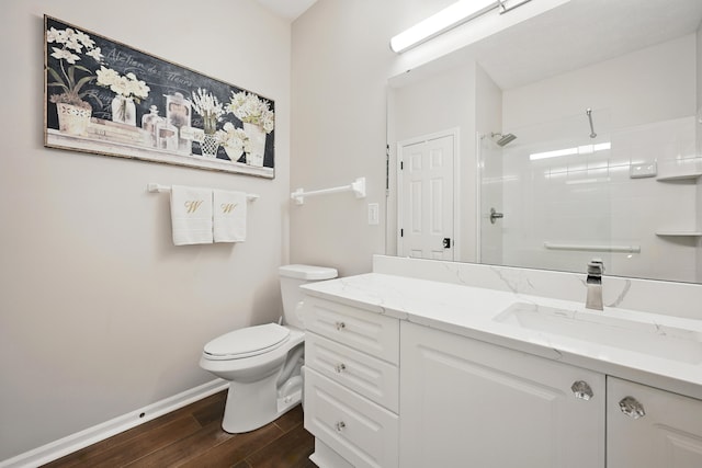 9072 Timberbrook Ln Unit B, Florence, KY 41042 - full bath featuring wood finished floors, vanity, toilet, a shower, and baseboards