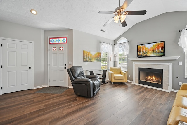 9072 Timberbrook Ln Unit B, Florence, KY 41042 - living area featuring ceiling fan, dark wood-type flooring, a tile fireplace, vaulted ceiling, and recessed lighting