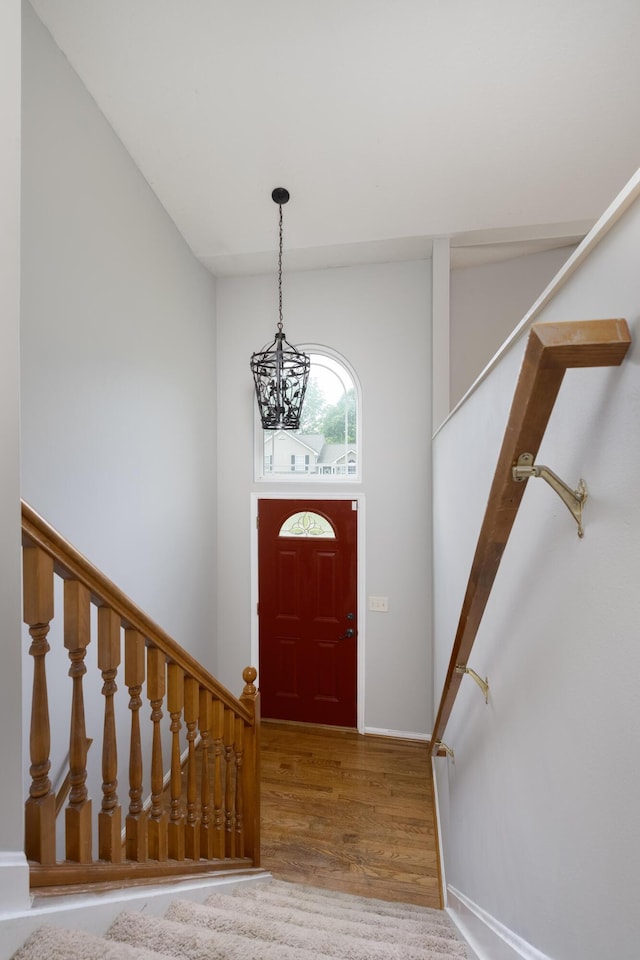 1837 Asbury Way, Hebron, KY 41048 - entrance foyer featuring a chandelier, stairway, wood finished floors, and baseboards
