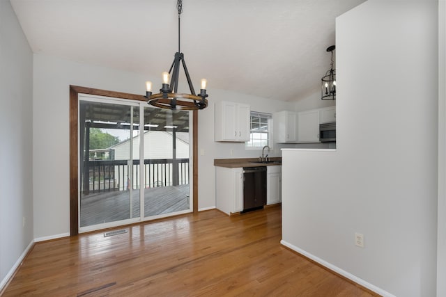 1837 Asbury Way, Hebron, KY 41048 - kitchen with a chandelier, dishwashing machine, a sink, white cabinetry, and stainless steel microwave