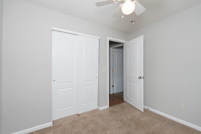 1837 Asbury Way, Hebron, KY 41048 - unfurnished bedroom with light colored carpet, baseboards, a closet, and a ceiling fan