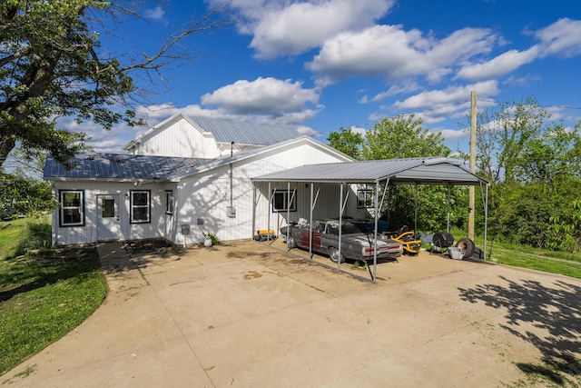 1120 Keefer Rd, Corinth, KY 41010 - modern farmhouse style home featuring driveway, a carport, and metal roof
