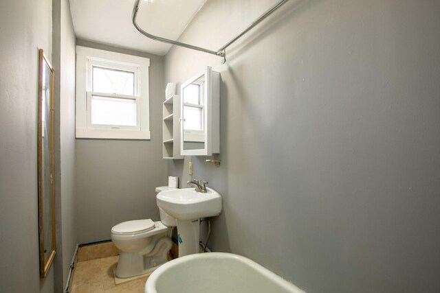 1707 Eastern Ave Unit 1709, Covington, KY 41014 - full bathroom with toilet, tile patterned flooring, and a baseboard heating unit