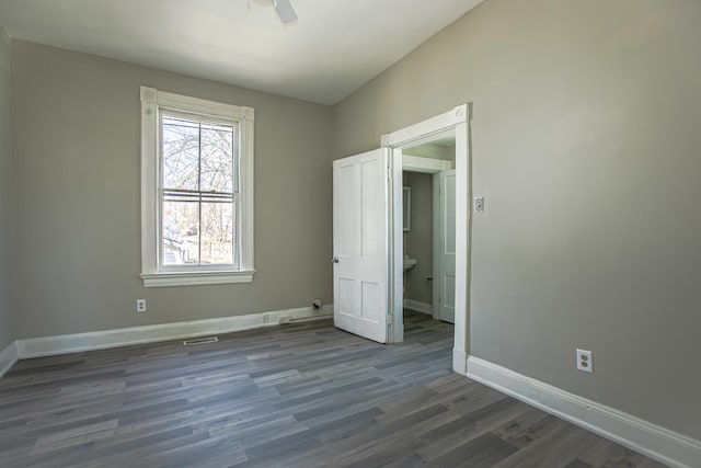 1707 Eastern Ave Unit 1709, Covington, KY 41014 - unfurnished bedroom with baseboards, wood finished floors, and ceiling fan