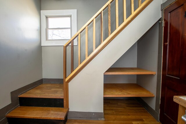 1707 Eastern Ave Unit 1709, Covington, KY 41014 - stairs featuring wood finished floors and baseboards