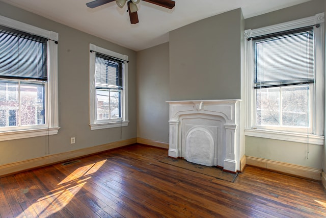 1707 Eastern Ave Unit 1709, Covington, KY 41014 - unfurnished living room featuring wood-type flooring, ceiling fan, healthy amount of natural light, and a fireplace