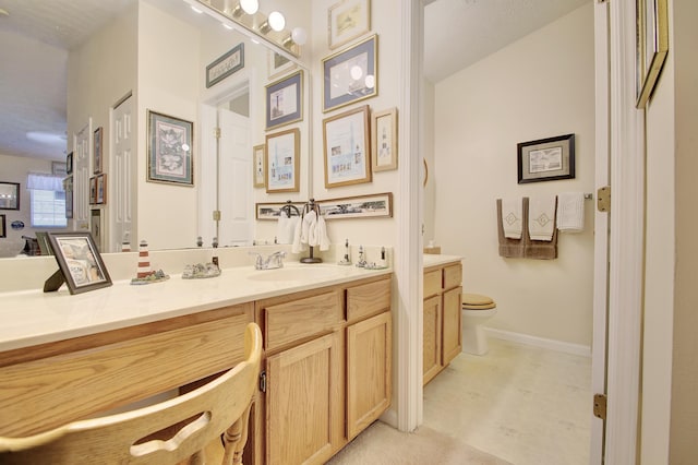 2239 Teal Briar Ln Unit 206, Burlington, KY 41005 - bathroom with vanity, toilet, and baseboards