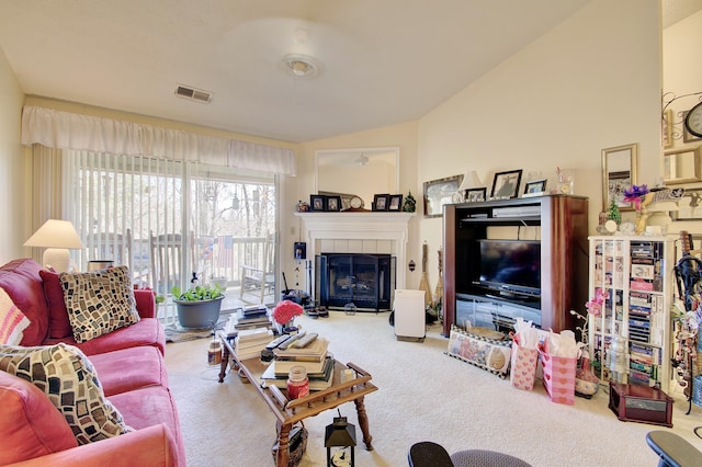 2239 Teal Briar Ln Unit 206, Burlington, KY 41005 - carpeted living room featuring vaulted ceiling and a tiled fireplace