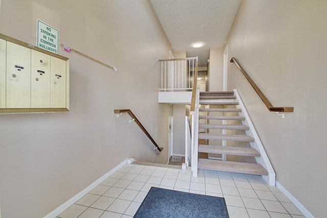 2239 Teal Briar Ln Unit 206, Burlington, KY 41005 - staircase featuring tile patterned floors and baseboards