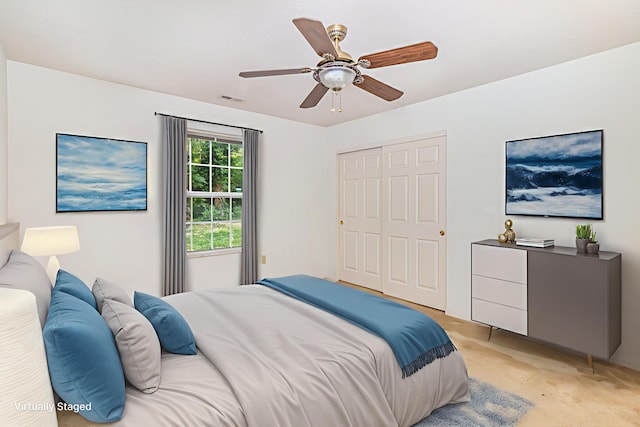 202 Langshire Ct, Florence, KY 41042 - bedroom featuring light colored carpet, a closet, and ceiling fan