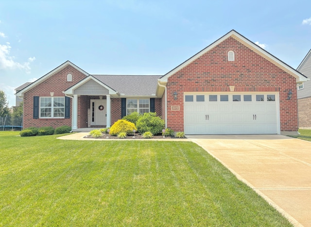3171 Windermere Hl, Covington, KY 41015 - view of front facade with brick siding, a front yard, concrete driveway, and a garage