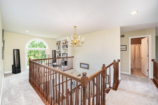 10659 Mountain Laurel Way, Union, KY 41091 - corridor featuring an upstairs landing, light carpet, a chandelier, and recessed lighting