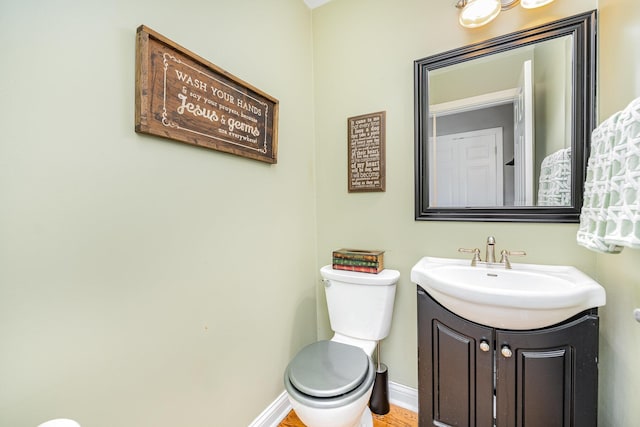 10659 Mountain Laurel Way, Union, KY 41091 - bathroom featuring baseboards, toilet, vanity, and wood finished floors