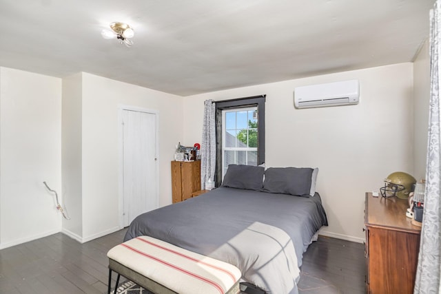 605 Lemon Northcutt Rd, Dry Ridge, KY 41035 - bedroom with a wall mounted air conditioner, baseboards, and hardwood / wood-style floors