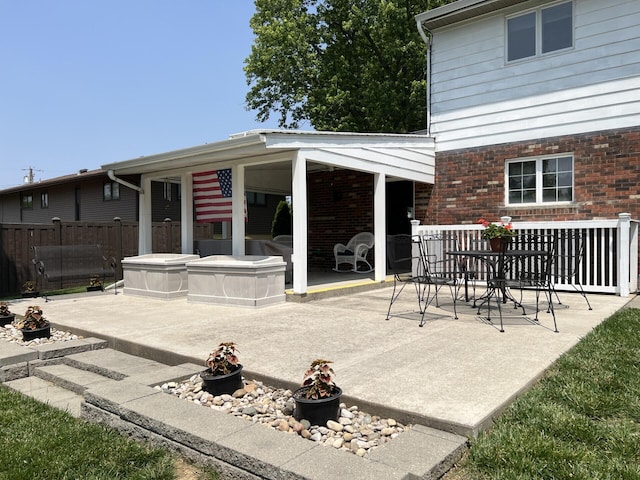 11 Alanna Dr, Wilder, KY 41076 - view of patio featuring a fire pit, a hot tub, and outdoor dining area