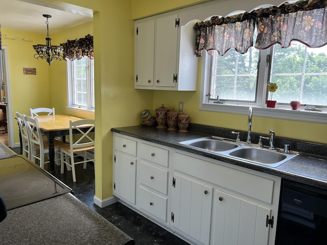 11 Alanna Dr, Wilder, KY 41076 - kitchen featuring dishwasher, a sink, dark countertops, and white cabinets
