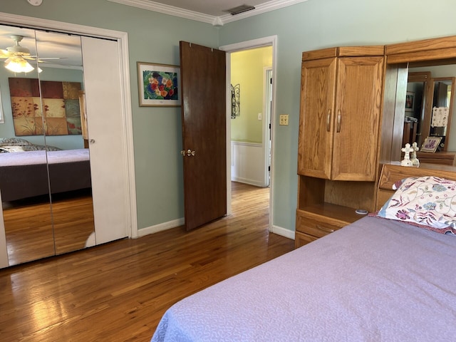 11 Alanna Dr, Wilder, KY 41076 - bedroom with ornamental molding, wood finished floors, baseboards, and a closet