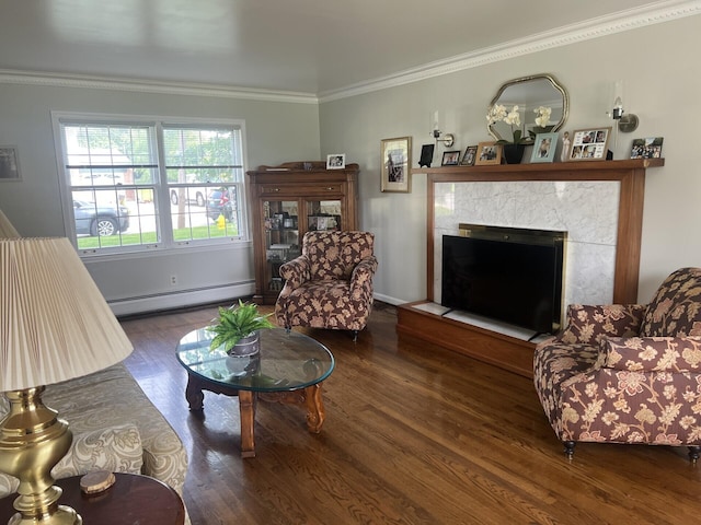 11 Alanna Dr, Wilder, KY 41076 - living room featuring a baseboard heating unit, ornamental molding, wood finished floors, a fireplace, and baseboards