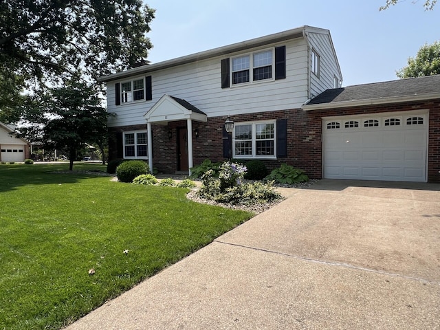 11 Alanna Dr, Wilder, KY 41076 - view of front of property with brick siding, an attached garage, driveway, and a front yard