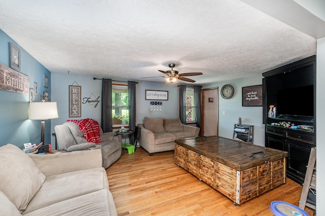2919 Watts Rd, Burlington, KY 41005 - living room featuring light wood finished floors, a ceiling fan, and a textured ceiling