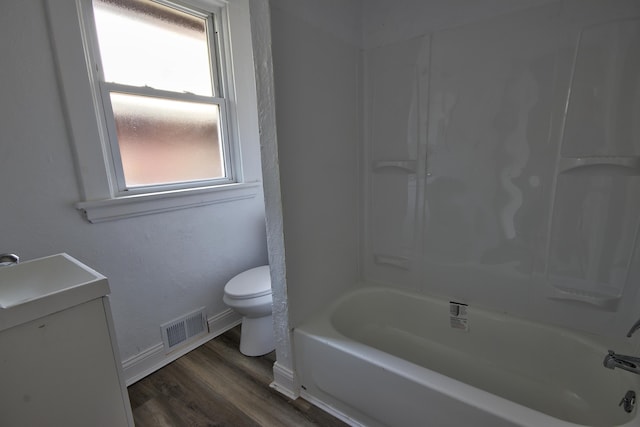 1823 Euclid Ave, Covington, KY 41014 - full bath with toilet, wood finished floors, baseboards, a sink, and shower / tub combination