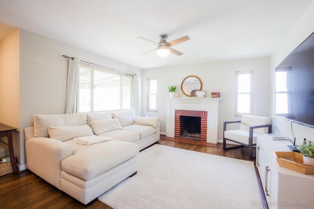 212 James Ave, Erlanger, KY 41018 - living room featuring plenty of natural light, a ceiling fan, dark wood finished floors, and a fireplace