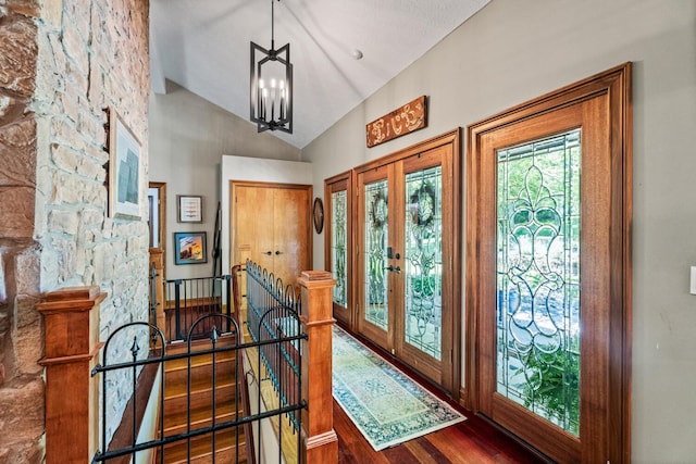 2709 Longbranch Rd, Union, KY 41091 - entryway with wood finished floors, vaulted ceiling, and a chandelier