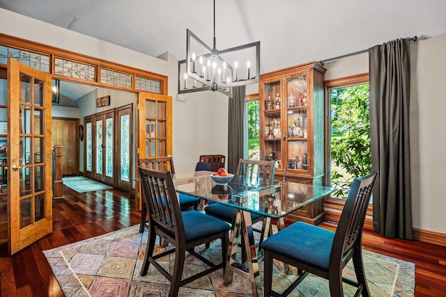 2709 Longbranch Rd, Union, KY 41091 - dining room with french doors, wood finished floors, baseboards, a chandelier, and high vaulted ceiling