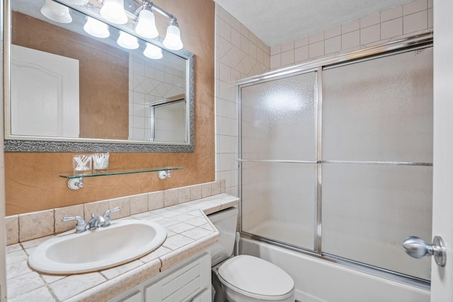 2709 Longbranch Rd, Union, KY 41091 - bathroom with vanity, shower / bath combination with glass door, and toilet