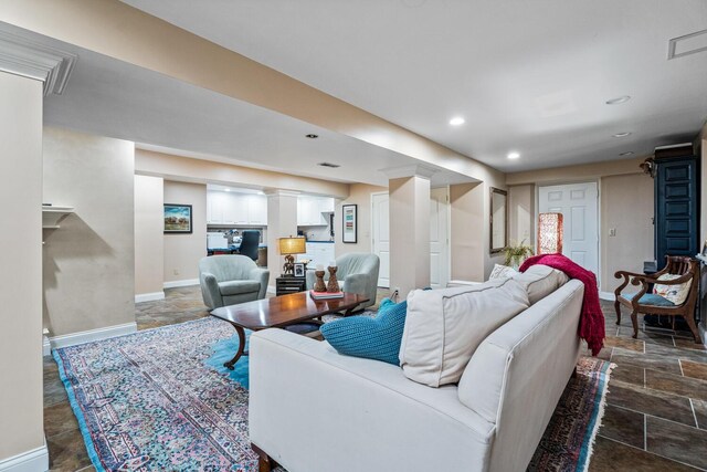 2709 Longbranch Rd, Union, KY 41091 - living room featuring dark stone finish flooring, baseboards, and recessed lighting