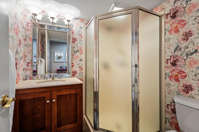 2709 Longbranch Rd, Union, KY 41091 - full bath featuring vanity, toilet, a shower stall, and wallpapered walls