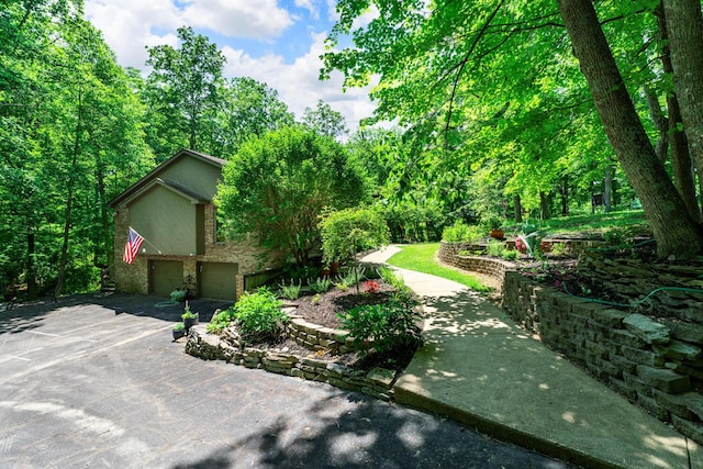 2709 Longbranch Rd, Union, KY 41091 - view of front of home featuring a garage and stucco siding