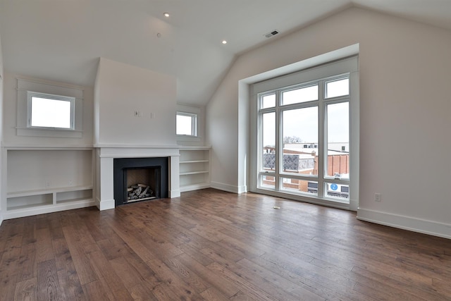 1 Highland Ave Unit 309, Fort Thomas, KY 41075 - unfurnished living room with lofted ceiling, plenty of natural light, hardwood / wood-style floors, and a fireplace